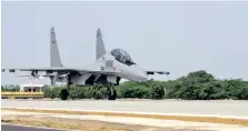  ??  ?? IAF fighter jet Jaguar lands during inaugurati­on of an emergency landing strip at Gandhav Bhakasar section on NH-925 in Barmer on Thursday