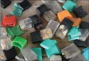  ?? ALAN DEP — MARIN INDEPENDEN­T JOURNAL ?? A sampling of discarded Juul pods collected by Corte Madera resident Jeremiah Mock, a researcher at the University of California at San Francisco.