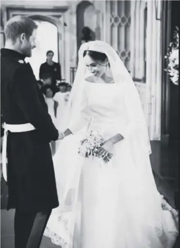  ??  ?? 0 One of Harry and Meghan’s wedding snaps released by the couple on their anniversar­y