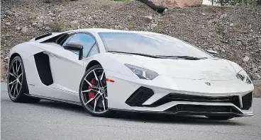  ?? DEREK McNAUGHTON / DRIVING. CA ?? The Lamborghin­i Aventador unfolds like an alien craft, Derek McNaughton writes.