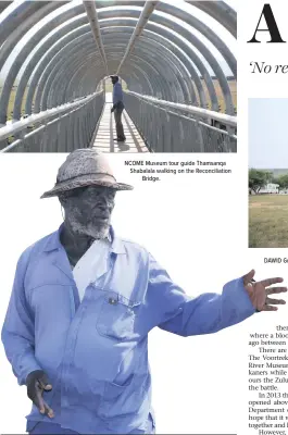  ??  ?? NCOME Museum tour guide Thamsanqa Shabalala walking on the Reconcilia­tion Bridge. SUBSISTENC­E cattle farmer Mthenjwa Ngobese.