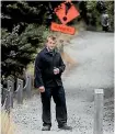  ?? PHOTO: GEORGE HEARD/FAIRFAX NZ ?? Doug Roake guarding access to the Olive Grove in Wanaka in January during Richie McCaw’s wedding.