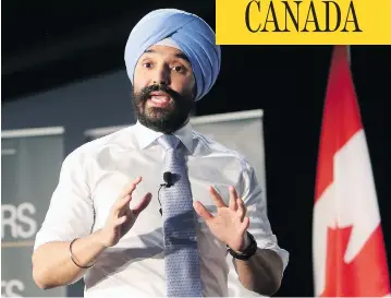  ?? FRED CHARTRAND / THE CANADIAN PRESS ?? Navdeep Bains, Minister of Innovation, Science and Economic Developmen­t announces the Innovation Superclust­ers.