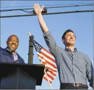  ?? AP file photo ?? Georgia Democratic candidates for U.S. Senate Raphael Warnock (left) and Jon Ossoff campaign n Marietta, Ga.