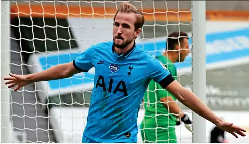  ??  ?? Landmark goal: Harry Kane wheels away in delight after racking up his 200th club goal