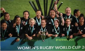  ?? Photograph: Charles McQuillan/World Rugby via Getty Images ?? New Zealand celebrate with the trophy following their World Cup 2017 final win over England. The tournament planned for 2021 has been delayed a year.