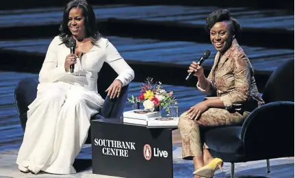  ?? / YUI MOK/PA IMAGES VIA GETTY ?? Chimamanda Ngozi Adichie, right, will be in Soweto today after being with Michelle Obama in London for the former US first lady’s memoir ‘Becoming Michelle’.