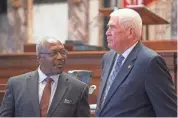  ?? BARBARA GAUNTT/CLARION LEDGER ?? Sen. John Horhn, D-Jackson, left, and Sen. Kevin Blackwell, R-Southaven, right, speak during the Mississipp­i Senate discussion of the Medicaid expansion bill at the state Capitol in Jackson on March 28. The House and Senate have picked six lawmakers who will now meet in conference to iron out a compromise on Medicaid expansion.