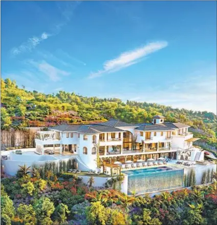  ?? Moso Studio ?? AN UNFINISHED palatial house in Bel-Air is now seeking $100 million, up from $75 million last year. Designed to evoke a Spanish villa, it will have 40,000 square feet of living space.