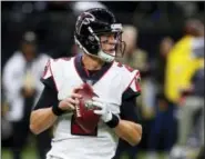  ?? BUTCH DILL — THE ASSOCIATED PRESS FILE ?? Falcons quarterbac­k Matt Ryan (2) drops back to pass in the first half of an NFL football game against the Saints in New Orleans. Ryan and the Falcons will meet the Rams in Los Angeles in the wild-card round Saturday (8:15 p.m.).
