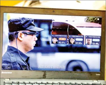  ?? — Reuters photos ?? A promotion video shows an actor wearing LLVision facial recognitio­n smart glasses during a demonstrat­ion at the company’s office in Beijing, China.