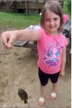  ?? John Hayes/Post-Gazette ?? Cassidy Betker, 6, of Monroevill­e caught her first several fish at Keystone State Park.