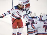  ?? GENE J. PUSKAR/AP ?? Rangers’ Chris Kreider (20) celebrates his goal during the third period in Game 6 against the Penguins on Friday in Pittsburgh.