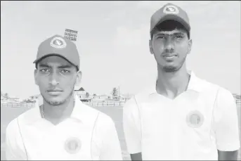  ??  ?? Man-of-the-match, Gourav Ramesh (right) picked up 3-19 and Marvan Prashad top scored for Berbice with 24.