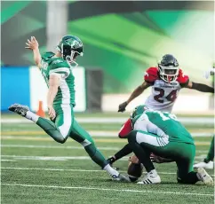  ?? MATT SMITH / THE CANADIAN PRESS ?? Roughrider­s placekicke­r Brett Lauther attributes his success to a close rapport with his holder Josh Bartel and his long snapper Jorgen Hus.