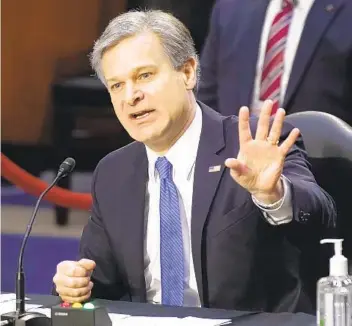  ?? PATRICK SEMANSKY AP FILE ?? FBI Director Christophe­r Wray told a Senate committee on March 2 that “the problem of domestic terrorism has been metastasiz­ing across the country for a long time now, and it’s not going away anytime soon.”