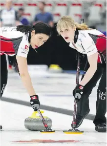  ?? JIM WELLS/FILES ?? Despite taking time off from curling, Jill Officer, left, has remained active, including filling in for lead Dawn McEwen, right, on longtime teammate Jennifer Jones’ rink.