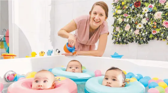  ?? Picture: TIM MARSDEN ?? Alisa Caddey, co-director of My Baby Bubble Spa, with babies Kason Mamanu, Ariana Puerta, (left) and Jackson Hupfeld.