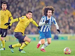  ?? AP ?? Brighton’s Marc Cucurella (right) duels for the ball with Chelsea’s Thiago Silva during their English League match in Brighton on Tuesday. The match ended 1-1. —