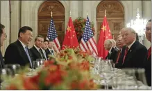  ?? PABLO MARTINEZ MONSIVAIS THE ASSOCIATED PRESS ?? President Donald Trump meets with Chinese President Xi Jinping during their bilateral meeting at the Group of 20 summit Saturday in Buenos Aires, Argentina.