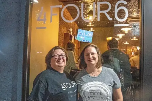  ?? Christian Snyder/Post-Gazette photos ?? Co-owners and sisters-in-law Marcy Sunday, left, and Maria Yeater held a soft opening of their 4Four6, a new distillery in Sharpsburg, on Jan. 11. The grand opening is Saturday.