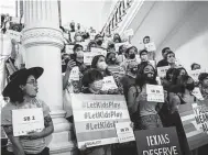  ?? Tamir Kalifa / Getty Images ?? LGBTQ+ supporters gather at the Texas Capitol to protest Republican-led legislatio­n that restricts the participat­ion of transgende­r student athletes.