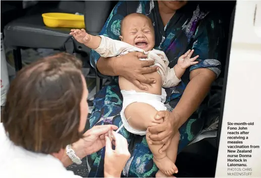  ?? PHOTOS: CHRIS McKEEN/STUFF ?? Six-month-old Fono John reacts after receiving a measles vaccinatio­n from New Zealand nurse Donna Horlock in Lalomanu.