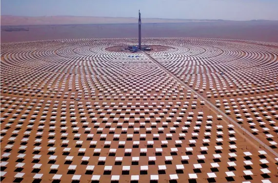  ?? AFP ?? A molten-salt solar thermal power plant in Dunhuang in China’s northwest. A growing number of countries and companies are turning away from coal, below, and targeting net-zero emissions by 2050.