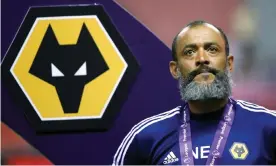  ??  ?? Nuno Espírito Santo saw his side beat Manchester City on penalties to win the Premier League Asia Trophy in Shanghai. Photograph: Thomas Peter/Reuters