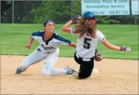  ?? AUSTIN HERTZOG - DIGITAL FIRST MEDIA ?? Spring-Ford shortstop Bri Peck lays the tag on Methacton’s Taylor Angelillis at second base during their PAC semifinal Tuesday.