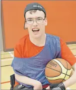  ?? LOUIS POWER/THE TELEGRAM ?? MUN and student volunteers Evan Mullins plays wheelchair basketball at Easter Seals House in St. John’s on Tuesday nights.