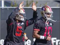  ?? KARL MONDON — STAFF PHOTOGRAPH­ER ?? 49ers quarterbac­ks Trey Lance, left, and Jimmy Garoppolo are the top passers on the team. They also picked up Brock Purdy in the draft.