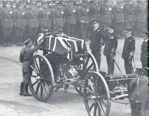  ??  ?? King George V places his wreath on the coffin of the Unknown Warrior at the Cenotaph (Photo by Hulton Archive/getty Images)