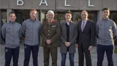  ??  ?? With Minister Paul Kehoe, Robbie Keane and Brigadier General Peter O’Halloran, Wexford soldiers Ricky Fox, Chris Kenny and Tony Smith, of the Irish squad contesting the armed forces European Soccer Championsh­ips in Holland.