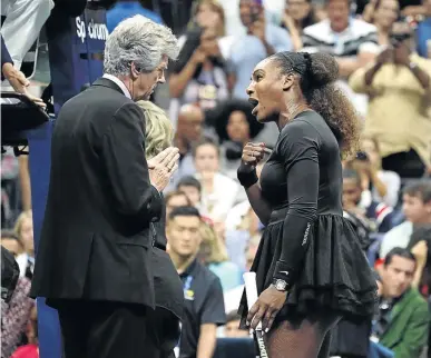 ?? / TIMOTHY A. CLARY / AFP ?? Serena Williams argues with referee Brian Earley, insisting she is owed an apology, during the women final against Naomi Osaka at the US Open on Saturday.