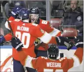  ?? LYNNE SLADKY — ASSOCIATED PRESS ?? The Florida Panthers’ Jamie McGinn (88) celebrates with Jared McCann after scoring in the first period of a 4-3 overtime victory over the Vegas Golden Knights. ExFlorida coach Gerard Gallant lost in his Florida return.