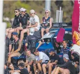  ??  ?? Fans gather at Fankhauser Reserve yesterday to take in the grand final.