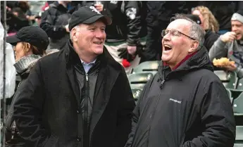  ?? SUN-TIMES FILE PHOTO ?? Former Mayor Richard M. Daley (right) shares a laugh with younger brother Bill as they wait for the start of the White Sox opening-day game in April 2016.