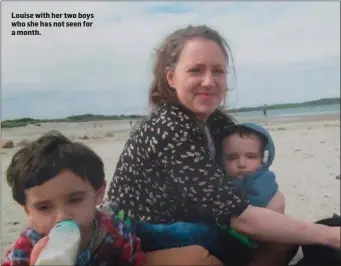  ??  ?? Louise with her two boys who she has not seen for a month.