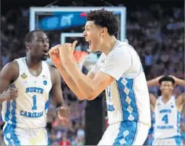  ?? Tom Pennington Getty Images By Ben Bolch ?? JUSTIN JACKSON of North Carolina gets happy late in the title game. The Tar Heels, who lost in the final moments last year, didn’t let that happen again.