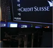  ?? SETH WENIG — THE ASSOCIATED PRESS ?? A sign displays the name of Credit Suisse on the floor at the New York Stock Exchange in New York on Wednesday.