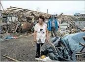  ?? JES AZNAR/GETTY ?? People inspect their damaged property Saturday in Alcala, Philippine­s, after typhoon Mangkhut made landfall.