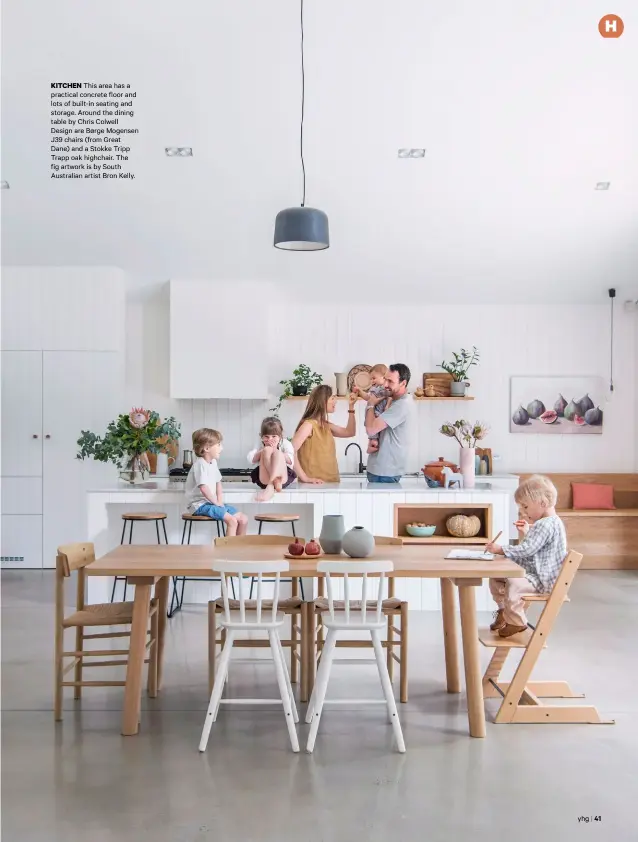  ??  ?? KITCHEN This area has a practical concrete floor and lots of built-in seating and storage. Around the dining table by Chris Colwell Design are Børge Mogensen J39 chairs (from Great Dane) and a Stokke Tripp Trapp oak highchair. The fig artwork is by South Australian artist Bron Kelly.
yhg
