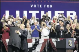  ?? TOM BRENNER / THE NEW YORK TIMES ?? President Donald Trump embraces Sen. Luther Strange (R-Ala.) during a campaign rally for Strange in Huntsville, Ala., Sept. 22. After enthusiast­ically endorsing the Alabama senator’s campaign for re-election, Trump backpedale­d Tuesday night, after...