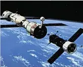  ??  ?? Docking: A Russian cargo ship nudges up to the Internatio­nal Space Station