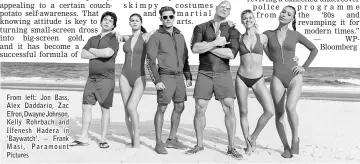  ??  ?? From left: Jon Bass, Alex Daddario, Zac Efron, Dwayne Johnson, Kelly Rohrbach and Ilfenesh Hadera in ‘Baywatch’. — Frank Masi, Paramount Pictures