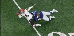  ?? RICH HUNDLEY III — FOR THE TRENTONIAN ?? Giants defensive lineman Dexter Lawrence, right, sacks Browns quarterbac­k Baker Mayfield during Sunday night’s game at MetLife Stadium.