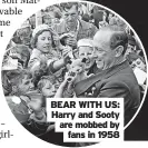  ?? ?? BEAR WITH US: Harry and Sooty are mobbed by fans in 1958