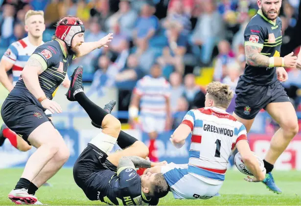  ?? Jackie Meredith ?? ●●Action from Hornets’ derby clash against Oldham at the Crown Oil Arena on Bank Holiday Monday