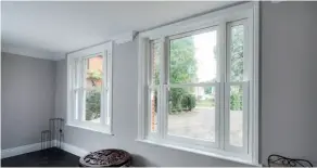  ??  ?? Above: Exuding a similar charm to traditiona­l timber units, these PVCU sliding sash windows were supplied by Anglian Home Improvemen­ts .Prices for a basic vertical slider measuring 800mm x 1,500mm start from £1,250